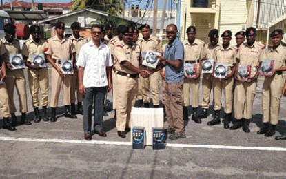 Guyana Sport Shooting Foundation donates safety gear to the Guyana Police Force