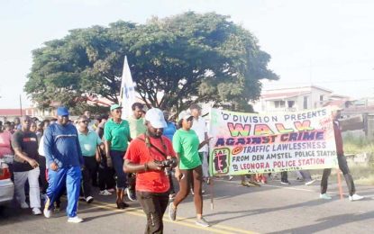 ‘D’ Division cops walk against crime, traffic lawlessness