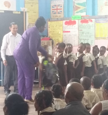 school primary st ambrose teacher head bags microscopes gets hands students
