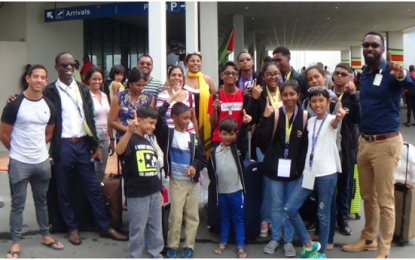 Director of Sport welcomes Chess and Swimmers from Carifta duties