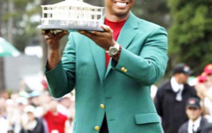 Woods wins Masters to claim first major in 11 years