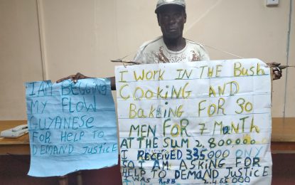 Homeless man pickets labour department for pay allegedly owed.
