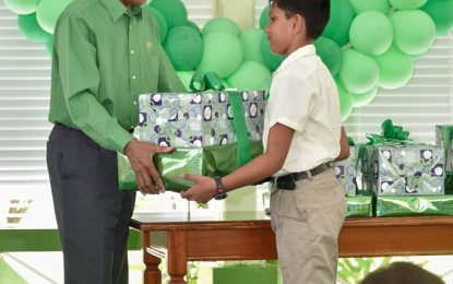 On his 74th birthday, Pres. Granger gifts laptops, printers to five NGSA students