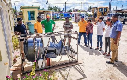 Govt. hands over outboard engine for use by Pomeroon students