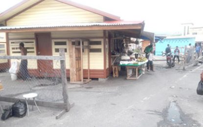 Who stole the chain link fence around the market stalls?