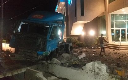 Three injured as truck crashes into Republic Bank fence at Triumph