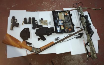 Four arrested as crossbow, guns, found in Corentyne home