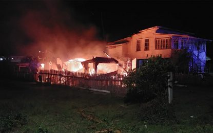 Two houses flattened by fire