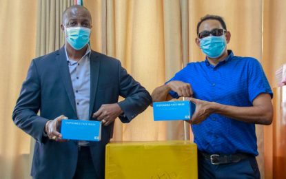 Former Guyanese cricketer donates 10,000 facemasks to MoE
