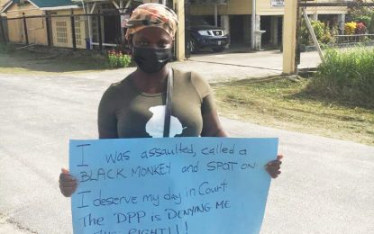 Policewoman holds protest against DPP’s decision to drop racial assault charge against lawyer