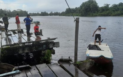 Pomeroon logger feared dead after falling off Charity Wharf