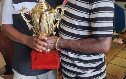 Marcel Arokium sponsors second place trophy for Champion of Champions 2 dominoes