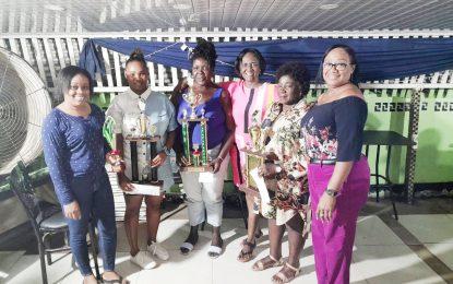 Akeila Peters wins Barbara Marshall dominoes tourney