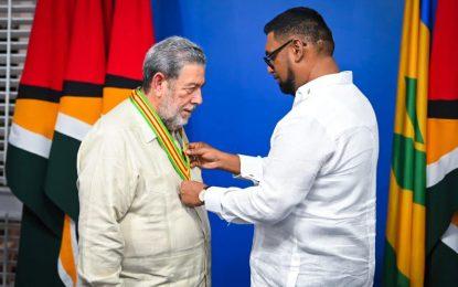 President Ali confers second highest national award to PM Gonsalves