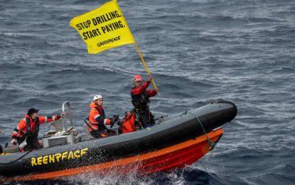 Protesters board Shell’s vessel demanding fossil fuel giant, “Stop drilling. Start paying”