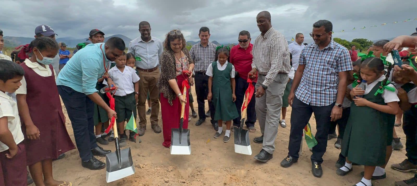 Minister of Education, Priya Manickchand alongside Minister of Local Government, Nigel Dharamall and the Ministry’s Permanent Secretary, Alfred King turning the sod for the construction of the secondary school at Karasabai on Tuesday.