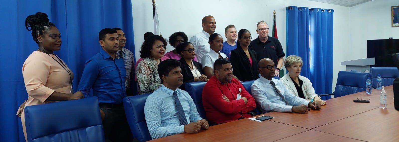 CEO of GPHC, Mr. Robbie Rambarran and Dr. Tarik Davidson Head of GPHC’s Paediatric Department (front centre) alongside officials of Gift of Life and the GPHC during Monday’s re-launch programme.