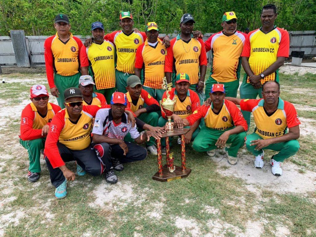 The victorious Caribbean Cricket Club 2 team strike a pose after the game.