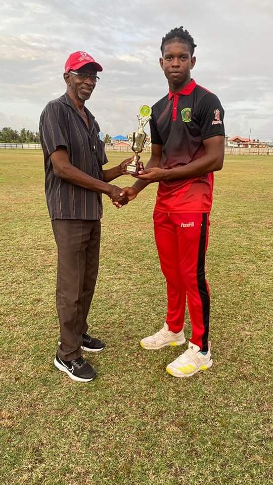 Isaiah Thorne (right) receives his Player of the Match trophy for his Blistering 73 (29 balls).
