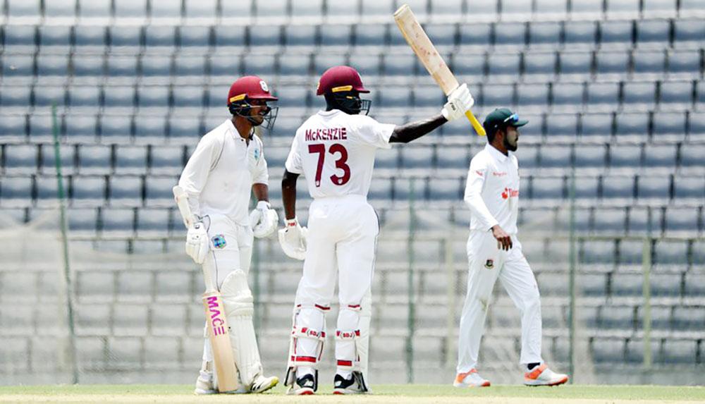 Tagenarine Chanderpaul (left) is unbeaten at stumps while Kirk McKenzie missed out on a century.