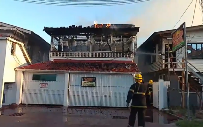 Top flat of El Dorado Trading gutted by fire