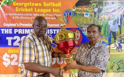 Trophy Stall batting with Prime Minister’s Softball Cup