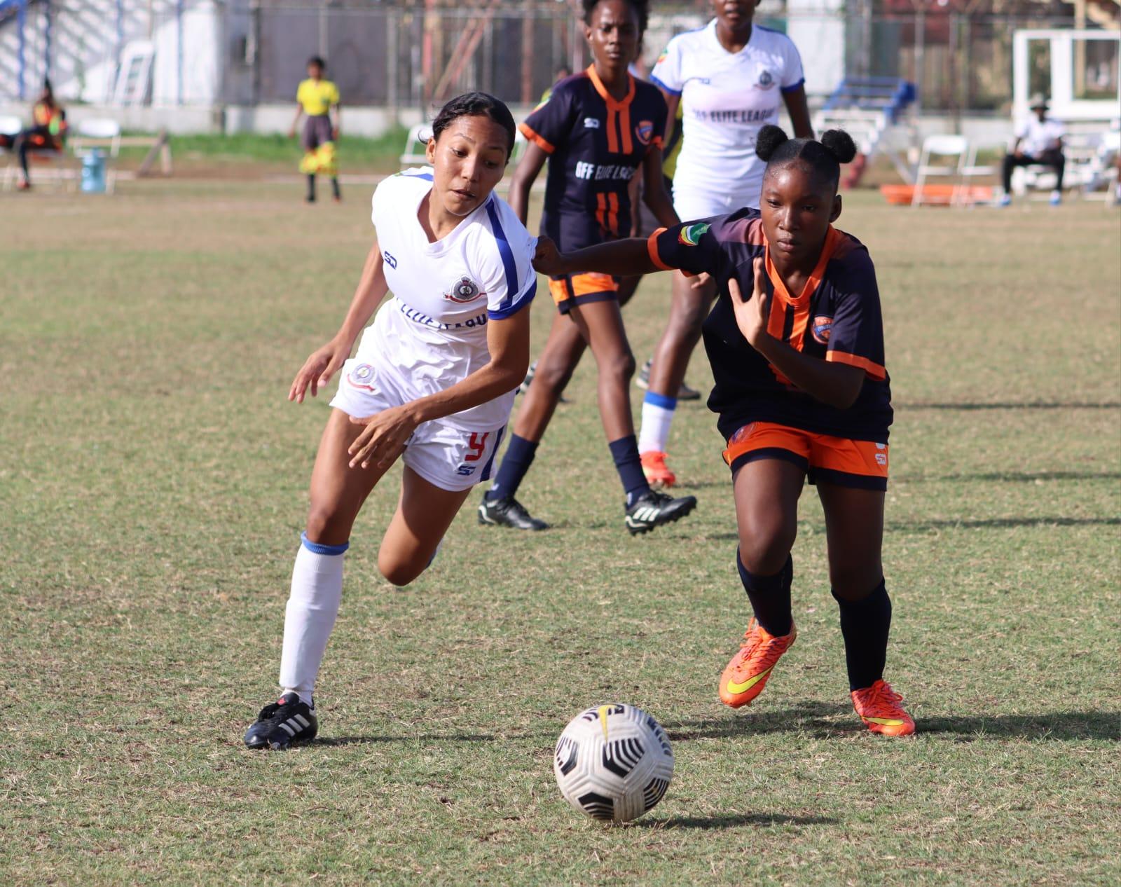 Action in the match between Guyana Police Force Football Club and Fruta Conquerors Football Club young ladies.