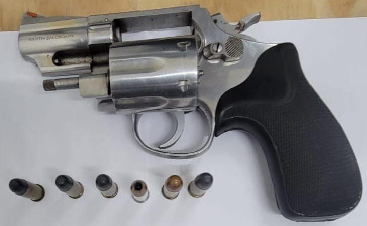 The black and silver .357 Magnum firearm along with the six .38 rounds of ammunition that the police found on the men.