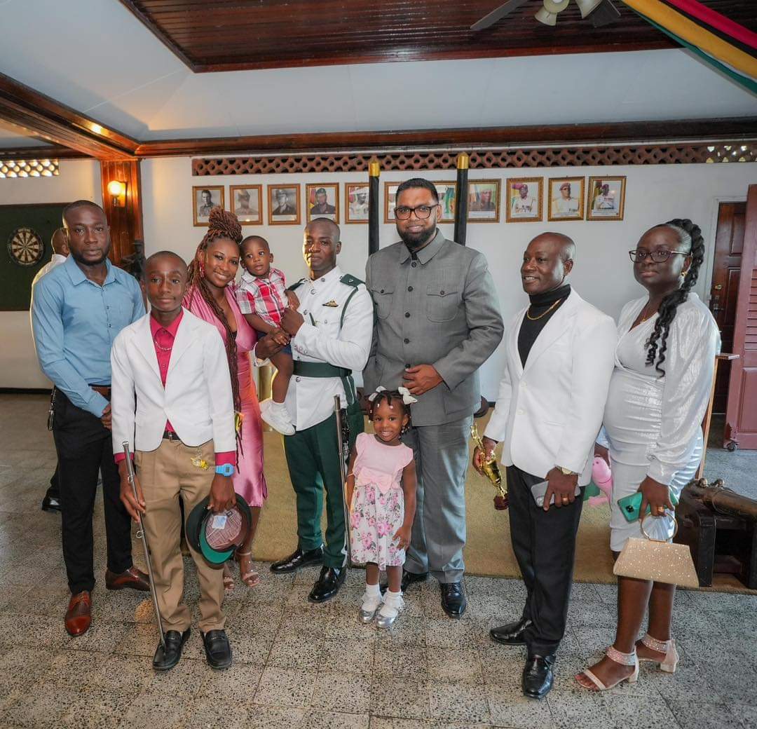 Following his graduation, Thomas and his family shared a moment with President Irfaan Ali.