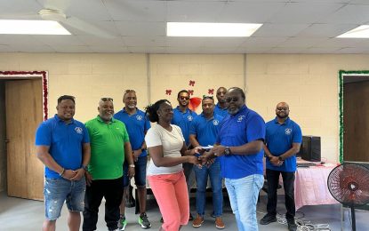 Lodge Alpha donates hampers, school supplies to girls’ home in Linden
