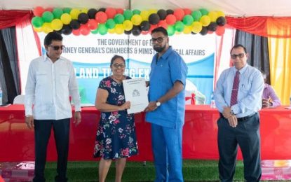 Over 180 Cotton Tree residents receive land titles after waiting for decades 