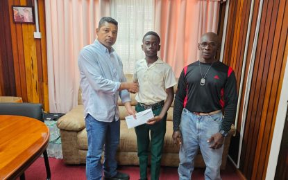 Under-16 boxer Keyron Britton receives sponsorship from USA-Based Guyanese