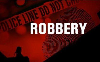 Stevedore Housing Scheme couple robbed at gunpoint in yard